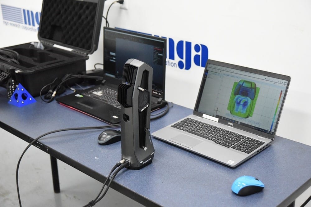 Image 2: A handheld Creaform scanner and the 3D model it produced.